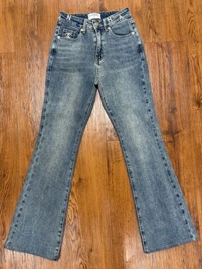 CHANEL Faded Blue Flare Denim Jeans with Logo Trim
